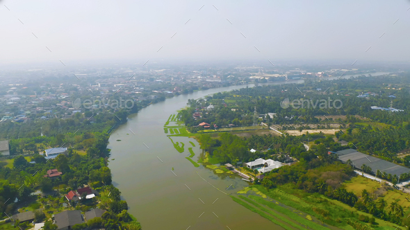 Aerial view of buildings with curve of Chao Phraya River. Cha Choeng Sao skyline