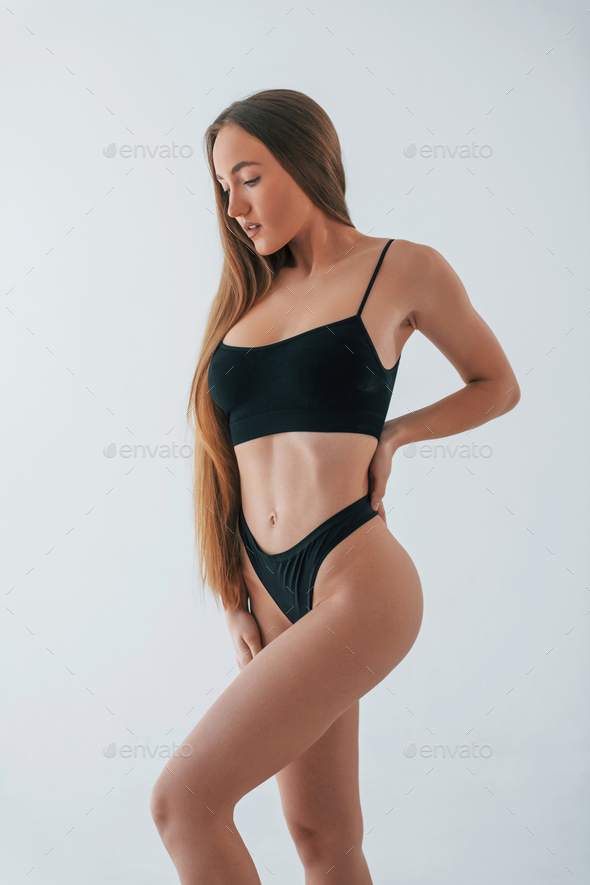 Studio Photo Of Skinny Girl Posing In Black Thong Panties Stock