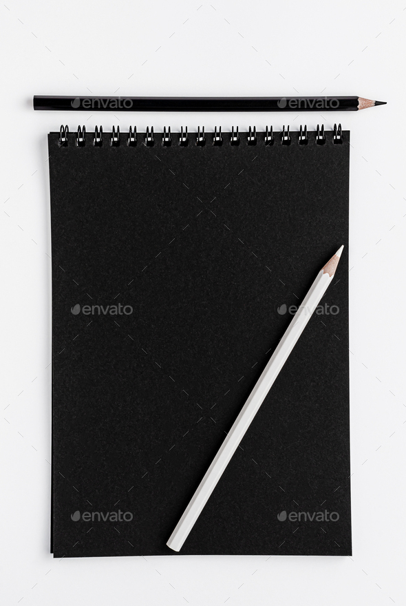 Black sketchbook mockup and pencils on white background. Top view, copy  space Stock Photo by Tania232323
