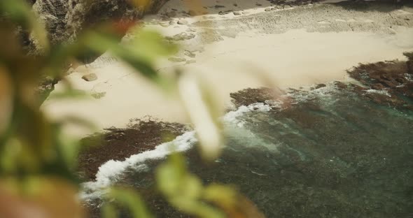Close Up Reveal of the Waves Slowly Crashing at the Stunning Tropical Sand Beach Surrounded By alt
