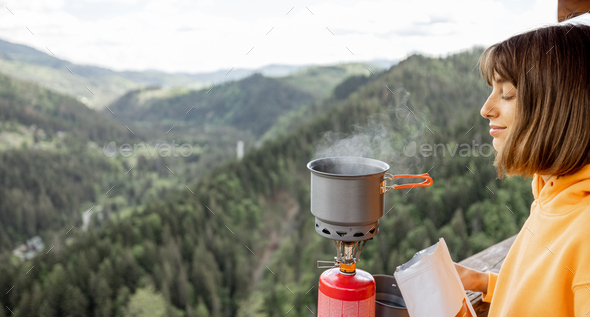 Portable gas bottle. A small compact travel bottle with a burner