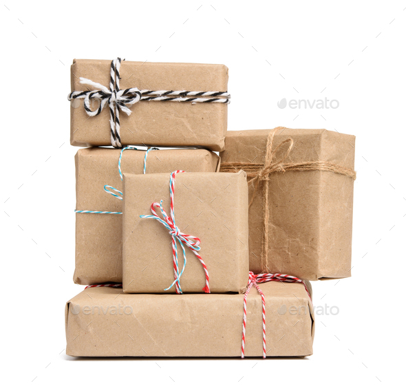Gift wrapping from Kraft paper wrapped with twine Stock Photo by