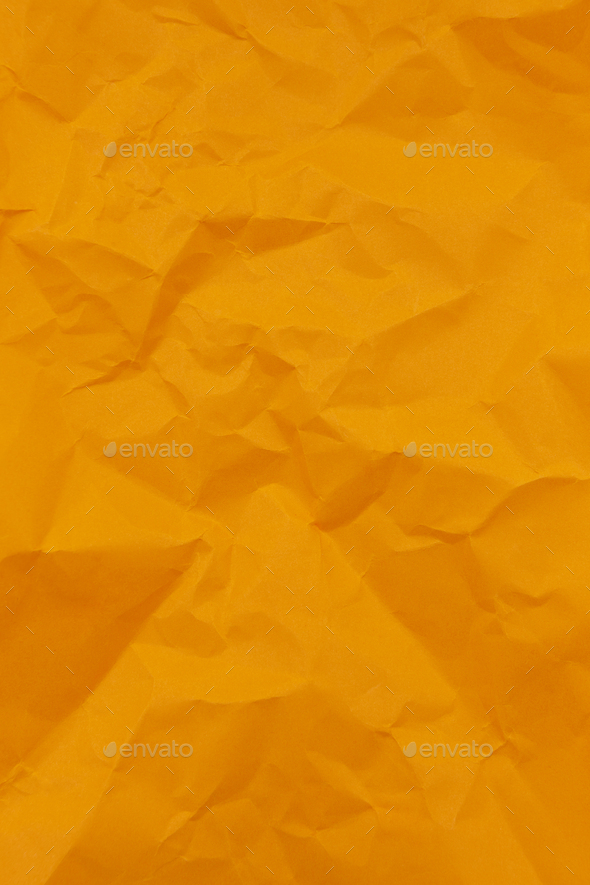 crumpled orange paper for orange background Stock Photo