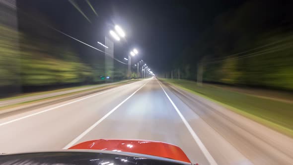 Drivelapse From Top Side of Car Moving on a Night Highway Timelapse Hyperlapse alt