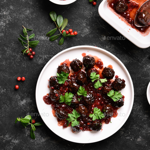 Meatballs with cranberry sauce - Stock Photo - Images