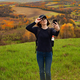 Middle aged female model makes selfie on smartphone at mountain background - PhotoDune Item for Sale