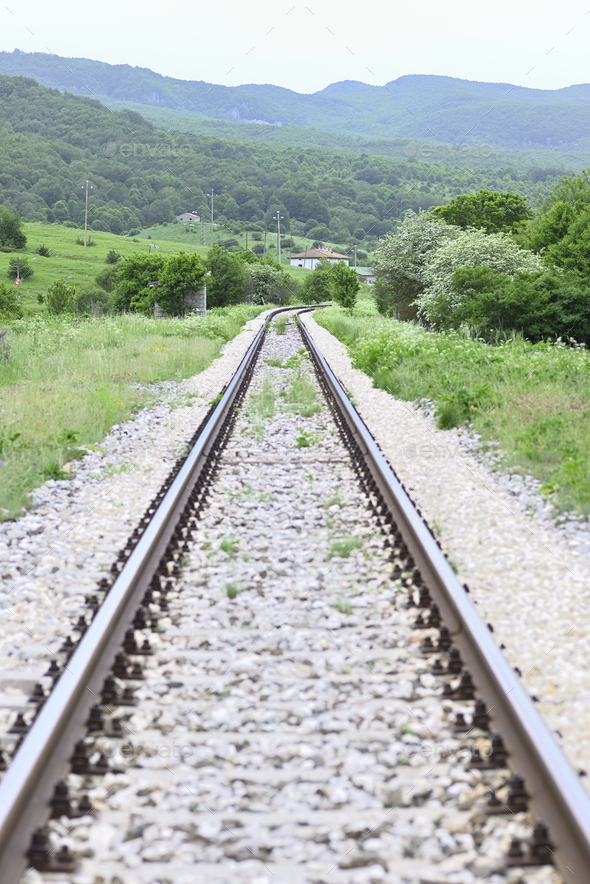 Solitary railway track for communication between mountain towns. - Stock Photo - Images