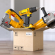 Cardboard box with elecric tools and construction equipment - PhotoDune Item for Sale