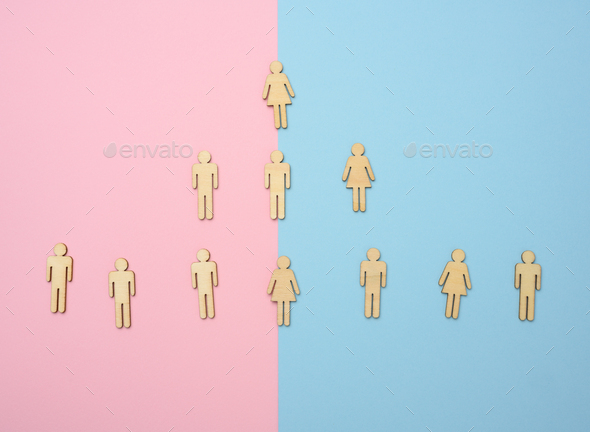 Wooden figures on a blue pink background, hierarchical organizational structure of management