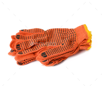 Textile orange work gloves on a white background. Protective clothing for manual workers