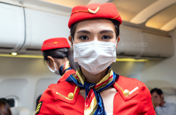Portrait of Asian beautiful air hostess looking at camera