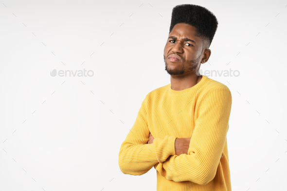 Portrait of african young angry man isolated over white background ...