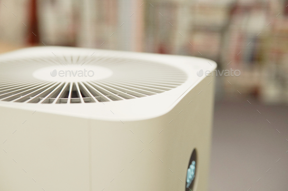 indoor air purifier in bedroom, air quality, respiratory health concept