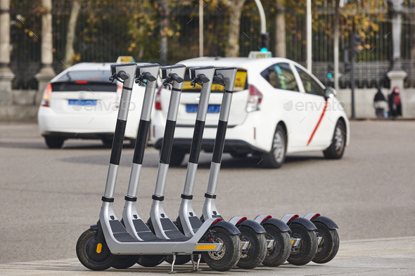 Electric scooters vehicles in the city. Urban mobility, sustainable lifestyle