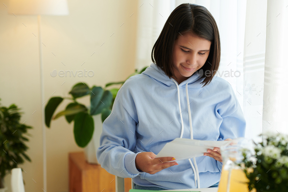 Schoolgirl Reading Letter from College