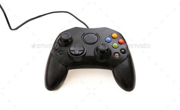 Video game controller isolated on white background. Gaming console control, black color, wireless