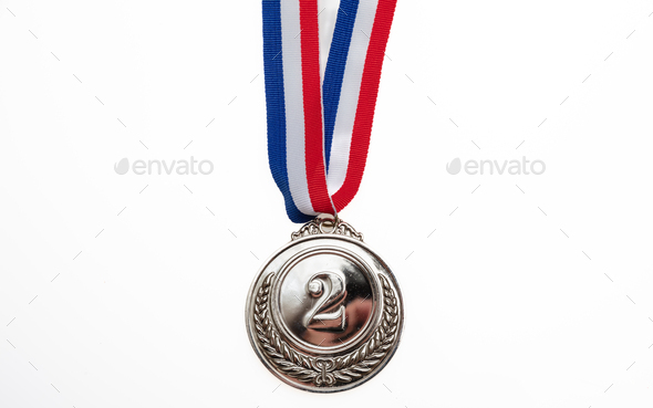 Silver medal. Champion trophy award and ribbon. Prize in sport for second place isolated on white