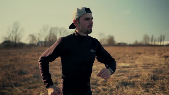 Running Man Workout And Checking Pulse Smart Watch. Triathlete Marathon Jogging Workout Training. alt