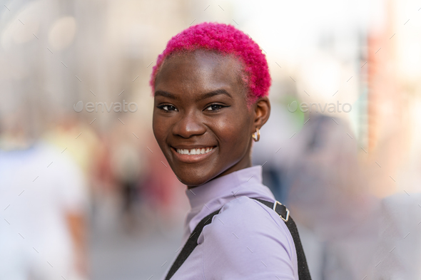 Modern stylish afro woman smiling to the camera - Stock Photo - Images