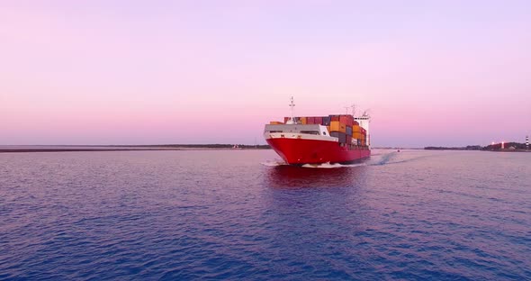 4K - in front of cargo ship alt