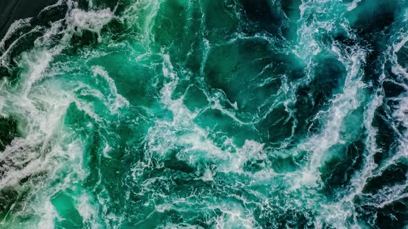 Waves of Water of the River and the Sea Meet Each Other During High Tide and Low Tide alt