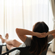 Young Asian woman relaxing in the bedroom in the morning - PhotoDune Item for Sale