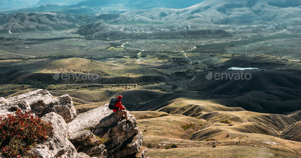 The concept of recreation and tourism. The man enjoys the beautiful views - Stock Photo - Images