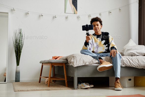 Teenager doing Live Stream - Stock Photo - Images