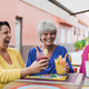 Happy senior female friends having fun together in the city while drinking healthy smoothies - PhotoDune Item for Sale