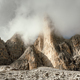 Incredible view of the Three Peaks of Lavaredo in morning fog - PhotoDune Item for Sale