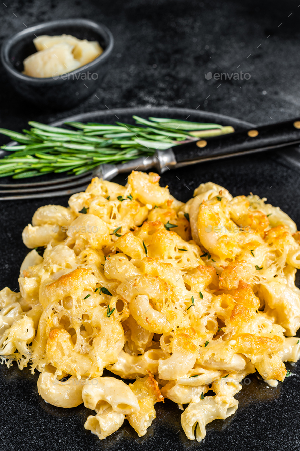 Baked Macaroni Mac and cheese American dish with Cheddar cheese sauce