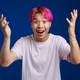 Asian boy with pink hair expressing surprise at camera - PhotoDune Item for Sale