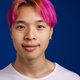 Asian boy with pink hair smiling and looking at camera - PhotoDune Item for Sale
