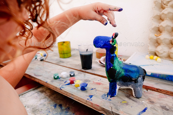 In summer the children's creative activities help to entertain themselves - Stock Photo - Images