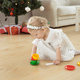 Child girl with cochlear implant plays at home. diversity and hearing aid - PhotoDune Item for Sale