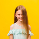 portrait of child Caucasian girl looking looking at camera and smiling - PhotoDune Item for Sale