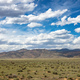 Landscape, desert land and blue sky with cloud. Sunny spring day in countryside. Southwest USA - PhotoDune Item for Sale