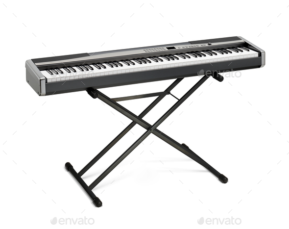 Digital portable piano on stand isolated on white background - Stock Photo - Images