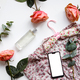 Fashion blogger workspace with smartphone with blank screen, peonies on a white background - PhotoDune Item for Sale