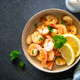 Frying shrimps with lemon in the bawl. - PhotoDune Item for Sale