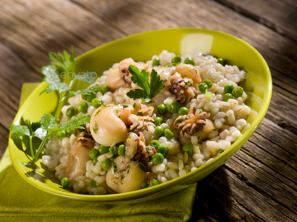 barley risotto with sepia and beans - Stock Photo - Images
