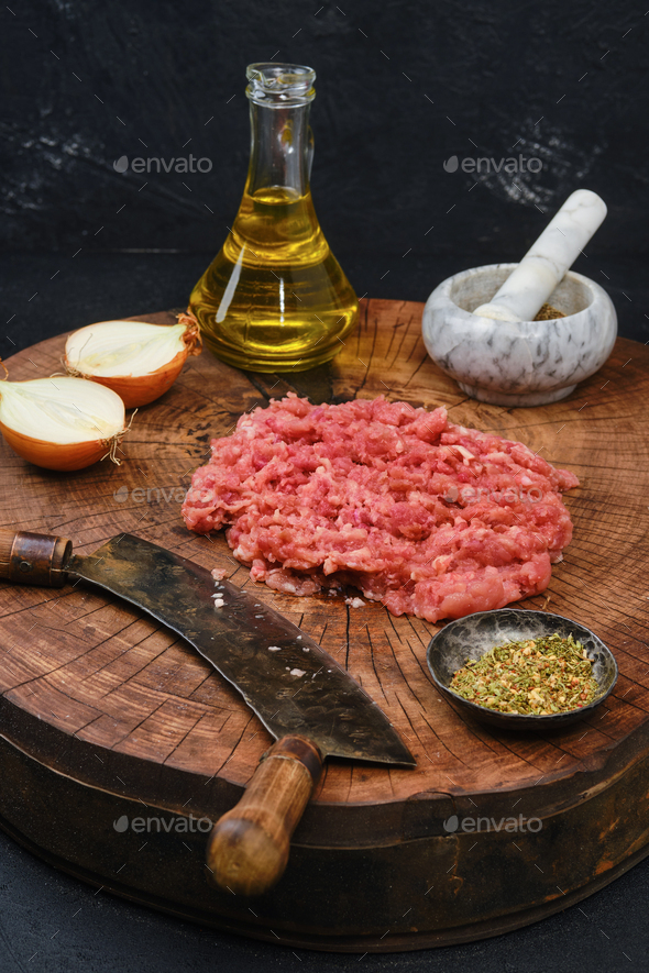 Rustic style of making fresh mince meat with chopping knife Stock Photo