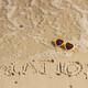 Inscription vacation, sunglasses and incoming sea wave on sand at beach. Summer time - PhotoDune Item for Sale