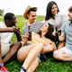 United group of millennial best friends hanging out relaxing on city park - PhotoDune Item for Sale