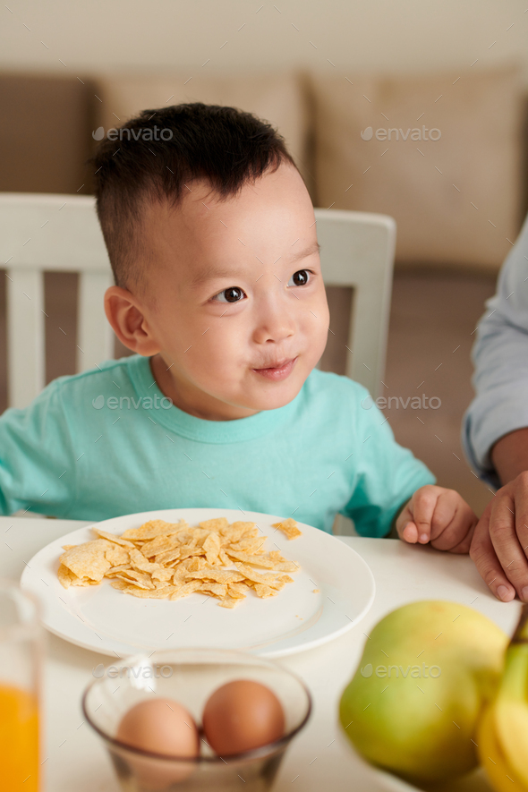 person eating corn chips with fuego flavor