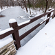 Rustic Bridge Over Frozen River In Winter. - PhotoDune Item for Sale