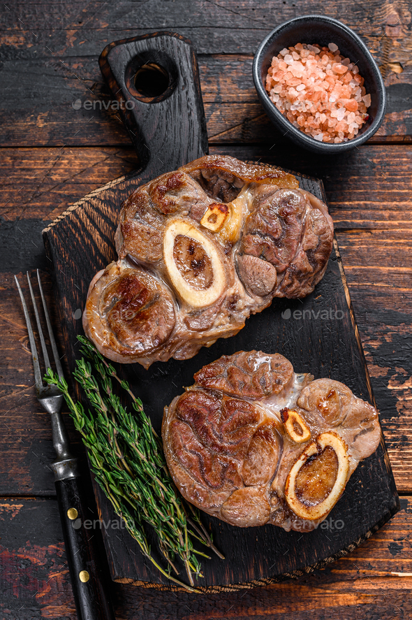 Stewed meat on the bone Osso Buco beef shank, italian ossobuco steak