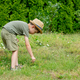 Little autist preschool boy in hat play in garden - PhotoDune Item for Sale