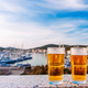 Cold beer and summer day on beach with blurred landscape of sea - PhotoDune Item for Sale