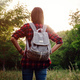 Young hipster girl enjoy sunset. Travel woman with backpack - PhotoDune Item for Sale